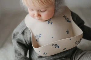 Mushie Silicone Baby Bib - Lilac Flowers New